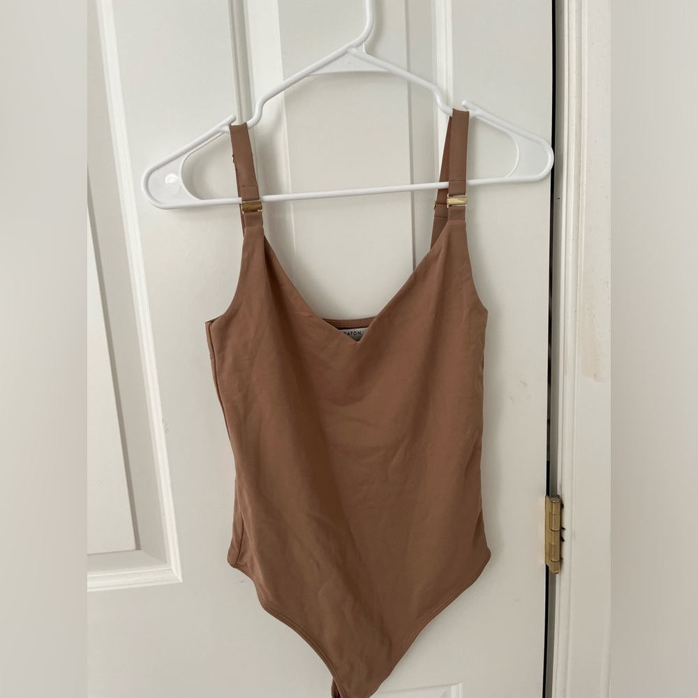 Beige Contour Bodysuit from Aritzia